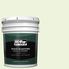 a white paint bucket with the words behr ultra stain - blocking paint and primer