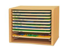 a wooden shelf with many books in it on top of a white background and the bottom section is open