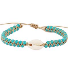 The Reef Break Cowry Shell cuff bracelet is a perfect addition to your favorite summer stack. Made with a cotton cord, natural cowry shell, and adjustable sliding string closure for a perfect fit. Colors: White, Turquoise Materials: Natural Cowry Shell, Imitation Turquoise, and Adjustable Cotton Cord Size: One Size, Adjustable Sliding String Closure Handmade by female artisans in Thailand. Casual Beaded Bracelets With Adjustable Length For Beach, Casual Beach Jewelry With Adjustable Cord, Casual Beach Bracelet With Adjustable Length, Casual Braided Bracelets With Adjustable Length For Beach, Adjustable Braided Bracelet For Beach Casual Wear, Adjustable Casual Braided Bracelets For Beach, Adjustable Coastal Jewelry For Vacation, Casual Resizable Braided Bracelets For Beach, Casual Adjustable Bracelet For The Beach