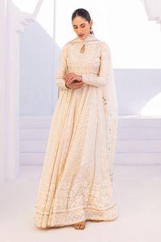 Beige Anarkali Set With Zari Work, Festive Cream Chanderi Salwar Kameez, Bollywood Beige Anarkali Set With Traditional Drape, Beige Bollywood Anarkali Set With Traditional Drape, Beige Anarkali Traditional Designer Wear, White Dola Silk Straight Kurta, Cream Chanderi Anarkali Set With Resham Embroidery, Cream Straight Kurta Anarkali Set In Chanderi, Cream Chanderi Anarkali Set With Straight Kurta