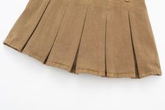 Get ready to turn heads in the Paulina Pleated Mini Skirt! This retro and casual skirt features a wide pleated design, perfect for creating a flirty and fun look. With a low waist and short inside, this skirt is all-match, making it a versatile addition to your wardrobe. Part of the Alees Fashion Streetwear Collection. Paulina Pleated Mini Skirt in Camel Retro, Casual Low Waist Wide Pleated Skirt All-Match Short Inside Alees Fashion Streetwear Collection Brown Fitted Pleated Skirt For Spring, Fitted Brown Pleated Skirt For Spring, Spring Pleated Brown Skort, High Waist Pleated Brown Skort, High-waisted Pleated Brown Skort, Brown Lined Tennis Skirt For Spring, High Waist Brown Pleated Skort, Pleated Brown Mini Skirt For Spring, Brown Pleated Mini Skirt For Spring