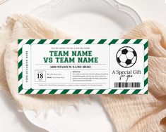 a soccer ticket sitting on top of a white plate