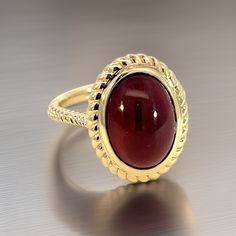 Natural Solitaire Finely Faceted Quality Spessartite Garnet Ring 6.5 14k Y Gold 8.08 Cts Certified $3,150 310586This is a Unique Custom Made Glamorous Piece of Jewelry!Nothing says, “I Love you” more than Diamonds and Pearls!This Solitaire Spessartite Garnet Ring has been Certified, Inspected, and Appraised by Gemological Appraisal LaboratoryGemological Appraisal Laboratory of America is a proud member of:- GIA Alumni Association- National Association of Jewelry Appraisers- International Consort Fine Jewelry Ruby Cabochon Ring, Formal Yellow Gold Cabochon Sapphire Ring, Yellow Gold Oval Cabochon Rings For Formal Occasions, Formal Yellow Gold Oval Cabochon Rings, Formal Cabochon Ruby Ring, Luxury Oval Cabochon 14k Stamped Rings, High Luster Oval Ring In 14k Gold, Luxury 14k Stamped Oval Cabochon Ring, Collectible Fine Jewelry Ruby Ring With Polished Finish