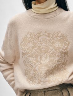 We partnered with The Metropolitan Museum of Art for the creation of this limited-edition cashmere crewneck sweater. It features a Hans Christian Anderson motif on the chest, originally drawn and cut from paper, telling the story of a Danish fairytale in embroidery resembling needlepoint. Wear it to immediately add interest to an otherwise simple look. Details Relaxed fit. Long sleeve. Length in size small is 22". The model is 5'8 1/2" and is wearing a size small. 100% Cashmere. Dry clean only. Embroider Sweater, Graphic Knit Sweater, Ornamental Pattern, Hans Christian Anderson, Cashmere Travel Wrap, Neutral Sweaters, Fitted Turtleneck, Simple Look, Embroidered Crewneck