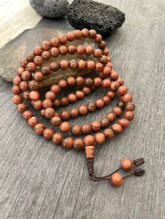 Unique and powerful Goldstone Japa mala Necklace from Nepal. A unisex piece that will be perfect for your day by day outfits and will be easy to match any other accessories. If it fits right can be a bracelet also. This is also a Buddhist praying 108 beads mala. The japa mala is 42.5cm- 16.75 inch long A unique addition to your jewelry collection. Enjoy Con salud Earthy Gemstone Beads Bracelets For Meditation, Earthy Gemstone Beaded Bracelets For Meditation, Spiritual Brown Beaded Bracelets With Gemstone Beads, Spiritual Brown Gemstone Beaded Bracelets, Spiritual Healing Beaded Bracelets With Oval Beads, Adjustable 108 Beads For Jewelry Making, Spiritual Beaded Mala For Festival, Spiritual Gemstone Beaded Bracelets For Festival, Earthy Necklaces With 108 Beads For Meditation