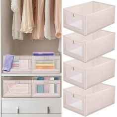 three white plastic storage bins next to an open closet door with clothes hanging on it