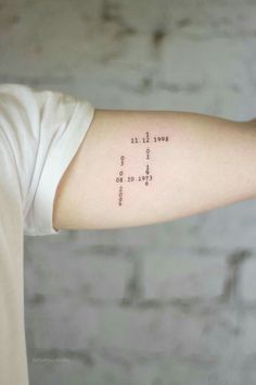 a person with a small tattoo on their arm