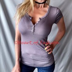 Super Cute Little Short Sleeve Top With Adjustable Button Neckline. Great Top For Daily Wear! Super Stretchy And Comfortable Fabric. Purplish Gray Color 95% Rayon, 5% Spandex Please See Measurements. Small Armpit To Armpit- 14" Length (Shoulder To Hem)- 23" Medium Armpit To Armpit- 15" Length (Shoulder To Hem)- 23.5" Large Armpit To Armpit- 16" Length (Shoulder To Hem)- 24" Model: 5'6, 118 Lbs, 25" Waist, 35" Hips, 32d. Wearing Size Small. Pocket Tee Shirts, Womens Black Shorts, Tops Short Sleeve, Henley Tee, Ladies Tee Shirts, Short Sleeve Pullover, Pullover Shirt, Men's Clothes, Accessories Bags