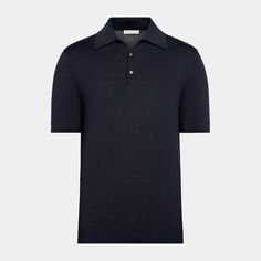 With a slim silhouette and ribbed hem that offers a polished, relaxed charm, this navy knitted polo boasts a softly structured collar and lustrous mother-of-pearl buttons. Short Sleeve Workwear Polo Sweater With Ribbed Collar, Short Sleeve Polo Sweater With Ribbed Collar For Workwear, Workwear Polo Sweater With Short Sleeves And Ribbed Collar, Fitted Navy Polo Sweater With Ribbed Collar, Classic Navy Polo Shirt With Ribbed Collar, Navy Short Sleeve Polo Sweater With Ribbed Collar, Elegant Formal Polo Shirt With Ribbed Collar, Classic Navy Collared Top, Elegant Short Sleeve Polo Sweater With Ribbed Collar