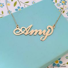 Order any name for your solid 14K gold Dylan style nameplate necklace!! A great personalized custom made gift for any occasion!! Birthday, Graduation Or any Holiday! *Both the nameplate and chain are all solid 14k gold. *Stamped for authenticity 14K. *1.0 cm tall first capital letter. *This listing is for one (1) name with one (1) capital letter only! *Names that are put in all capitals will be made like the sample photo. *The nameplate Is .8mm high quality thickness. *In the photo you can view Elegant 14k Gold Custom Name Necklace, Classic Personalized Name Necklace, Elegant Custom Nameplate Name Necklace, Elegant Custom Name Nameplate Necklace, Classic Nameplate Necklace, Custom 14k Gold Nameplate Necklace, Classic Gold Name Necklace, Gold Nameplate Necklace For Formal Occasions, Elegant Gold Nameplate Necklace