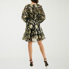 Adorned with a black and metallic gold floral print, this Premier Amour women's fit-and-flare dress is sure to turn heads. It's made from flowy chiffon and has a V-neck, long puffed sleeves, and a tie-waist that creates a flattering silhouette. Wear it with strappy heels. Features: Tie-WaistNeckline: V NeckSleeve Length: Long SleeveSleeve Style: Puffed SleeveApparel Length: 35 InchesDress Length: Short LengthFiber Content: 60% Polyester, 40% MetallicFabric Description: ChiffonLining Material: Po Flare Dresses, Long Puff Sleeves, Fit N Flare Dress, Puffed Sleeves, Gold Floral, Strappy Heels, Fit And Flare Dress, Fit Flare Dress, Fit & Flare