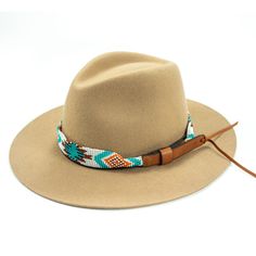 Price includes a Lola Sambboho hat & an Aztec Flat hatband. Save 10% with this bundle. Select hat size. Hatband is one size fits all. Hatband is removable.  An iconic must-have Fedora hat that will never get out of fashion. Sambboho's Lola hat has a soft brim and indented crown. A chic piece to be worn at all seaso Cheap Brown Hat Bands For Festivals, Adjustable Brown Straw Hat, Adjustable Beach Fedora One Size, Bohemian Adjustable Panama Hat For Travel, Adjustable One Size Fedora For Beach, Adjustable Bohemian Panama Hat For Travel, Adjustable Bohemian Straw Hat For Outdoor, Adjustable Bohemian Straw Hat For Travel, Adjustable Beach Fedora