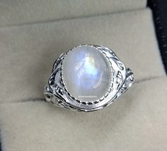 "Natural Moonstone Ring oval 925 sterling silver Christmas gift /gift for her beauty ring Handmade Anniversary Jewelry June Birthstone Stone Name = Moonstone Ring Stone Color =   white Ring Size :- All US Sizes Available Metal Purity :- 925 Sterling Silver  Our Goal is 100% Customer Satisfaction Moss Agate Collection  https://www.etsy.com/shop/SilverOceanPoint?ref=seller-platform-mcnav&section_id=39011648 Tourmaline & Ruby Collection  https://www.etsy.com/shop/SilverOceanPoint?ref=seller-platfor Oval White Moonstone Birthstone Ring, White Oval Moonstone Birthstone Ring, White Oval Moonstone Ring Gift, Oval White Crystal Gemstone Ring, White Oval Cabochon Moonstone Ring For Anniversary, White Oval Crystal Gemstone Ring, Oval White Moonstone Ring For Gift, White Moonstone Rings As A Gift, White Moonstone Rings For Gift