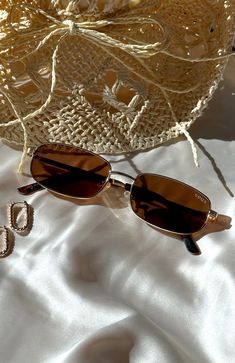 Canyon Sunglasses Gold/Brown Lens | White Fox Boutique US Beige Sunglasses, Sunglasses Brown, Brown Lens, Golden Sun, Sunglasses Collection, Brown Sunglasses, Glass Frame, Gold Link, White Fox Boutique