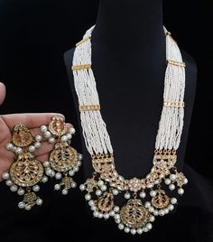 Most eligible gift for someone you love and someone very special for you. Best gift for your anniversary. Best gift for her Birthday. Necklace : 1 Earrings : 1pair. Anniversary Kundan Necklace With Tilla Detailing, Gold Kundan Necklace With Meenakari For Anniversary, Kundan Necklace With Tilla For Anniversary And Festivals, Kundan Bridal Necklace Gift For Eid, Heavy Kundan Bridal Necklace For Anniversary, White Hand Set Jewelry For Eid, Kundan Necklace As A Diwali Gift, White Kundan Bridal Necklace For Celebration, White Kundan Necklace For Eid, Temple Jewelry Style