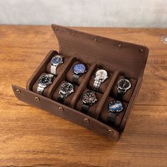 Personalized 8 Slots Gennuine Leather Watch Box for Men, Mens Watch Organizer Watches Display Case Storage Boxes PRODUCT INFORMATION --------------------------------------------- --Product Size: (L x W x H) - 30.8cm * 7.5cm * 18.5cm --Item Weight: 0.9kg --Color: Brown ◾Important: This product does not include any watch. This Genuine Leather Watch Roll Organizer is specifically designed for your timepieces protection during your travels. The leather case is functional for storing your watches at home either. Putting your timepieces in your luggage without protection may not end up well! this watch storage cases are the Best Choice if you need one! Super easy to remove the one part cushion (not separable) from the roll in anywhere (airport, stations, hotel) when you want to wear one of your Luxury Wear-resistant Watch For Gift, Luxury Wear-resistant Watches As Gift, Business Brown Watch Accessories Box, Business Brown Box Watch Accessories, Brown Watch Accessories With Subdials As Gift, Leather Strap Watch Accessories Gift, Brown Watch Accessories Box As Gift, Father's Day Gift Brown Watch Accessories, Leather Watch Accessories With Box For Gift