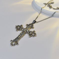 This price is for a necklace only, others are not included.   	 		 			Size 			Free Size 		 		 			Chain Perimeter 			65 		 		 			Cross Length 			7.5 		 		 			Cross Width 			5.5 Silver Clavicle Chain Jewelry With Cross Pendant, Elegant Metal Cross Necklace With Clavicle Chain, Silver Cross Jewelry With Adjustable Chain, Silver Tarnish Resistant Cross Necklace Gift, Silver Tarnish Resistant Cross Necklace For Gift, Elegant Nickel-free Cross Pendant Necklace, Silver Tarnish-resistant Cross Necklace For Gift, Elegant Silver Chain Cross Necklace Gift, Elegant Metal Crucifix Cross Necklace