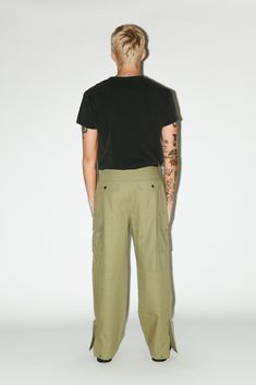 A utility cargo for the ultimate off-duty uniform. Easy-going and relaxed, these cargos are pleated for a slightly wider, straight-leg silhouette. Open the side-zip hems for a sportier 90's aesthetic. Dress down formal blazers and button-ups with an effortless, casual contrast. Formal Blazer, Cargo Pant, Cargo Pants Men, Split Hem, Off Duty, Dressed Down, Cargo Pants, New Product, Mens Pants