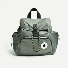 a backpack with an eye on the front