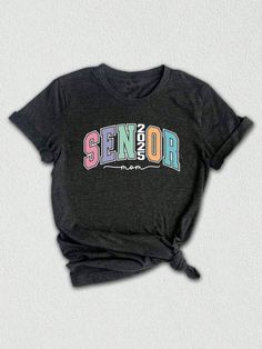 Get ready to celebrate the graduating class of 2025 with this trendy and stylish Senior 2025 T-shirt!  Designed specifically as a thoughtful graduation gift, this tee is perfect for seniors, college students, and anyone looking to commemorate this special milestone in style. Featuring a unique design that combines all the key elements of a truly memorable senior year, this shirt is a must-have for anyone in the class of 2025. ✨ The eye-catching graphic showcases the words "Senior 2025" in bold, Graduation Letter Print Crew Neck T-shirt, School Spirit T-shirt With Graphic Print For Graduation, Casual T-shirt With Text Print For Graduation, Black T-shirt With Graphic Print For Graduation, Casual Letter Print Shirt For Graduation, Casual Graduation Shirt With Text Print, Short Sleeve Shirt With Text Print For Graduation, Casual Shirt With Text Print For Graduation, Casual Shirt With Letter Print For College Events