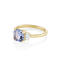 A vintage-inspired design, this bespoke ring features a 1.86ct sapphire custom cut by Glenn Preus and sourced from Ceylon. Its violet blue hues are complemented by two .14ct Cadillac cut diamonds. Complimentary resizing available for sizes 4 through 8; simply add a note with preferred size when checking out. Please note resizing this ring adds an extra 7-10 days for delivery.