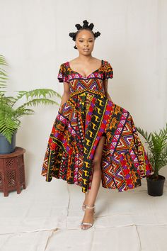 This beautiful African print dress is the perfect dress to make a statement. This dress will make you the cynosure of all eye. Suitable to wear for dinners, dates, hangouts, movies, weddings and anywhere you will love to stand out. Made with 100% African wax cotton Care instructions  Wash with mild soap, do not bleach Multicolor V-neck Dress With Digital Print, Multicolor Digital Print Maxi Dress, Bohemian Knee-length Printed Midi Dress, Bohemian Midi Dress With Abstract Print, Fitted Patterned Dress With Digital Print, Printed A-line Sundress Midi Dress, Red Maxi Length Dress With Abstract Print, Black Dress With Digital Print For Summer, Black Summer Dress With Digital Print