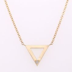 Diamond Triangle Necklace Solitaire Triangle Geometric Diamond 14K Gold Dainty Pendant With Solid Gold Chain This beautiful triangle-shaped necklace is crafted in 14K yellow gold (but is also available in 14k white and rose gold) with a delicate diamond accent (weight: 0.005cttw, G-H color VS1 - VS2 clarity). Triangle measurements: 11 mm (0.43 inch) wide, 9.5 mm (0.37 inch) tall. Comes with 14K solid gold chain, 16 inch or 18 inch long. PROUDLY MADE FROM SCRATCH IN NEW YORK CITY. Please allow 5 Gold Triangle Jewelry For Formal Occasions, Modern Gold Trillion Cut Jewelry, Modern Gold Jewelry With Trillion Cut, Modern Trillion Cut Gold Jewelry, Elegant Triangle Yellow Gold Jewelry, Elegant Yellow Gold Triangle Jewelry, Minimalist Triangle Jewelry For Formal Occasions, Gold Diamond Triangle Jewelry, Gold Triangle Diamond Jewelry