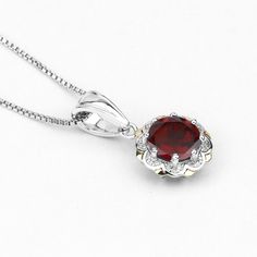 "Garnet Pendant, Natural Red Garnet Round and White Diamonds Pendant Necklace in Sterling Silver & 14K Yellow Gold, January Birthstone Flaunt Yourself With This Garnet And White Diamond halo Pendant. The Natural Gemstones Have A Combined Weight Of 2.32 Carats And Are Set In 14K Yellow Gold With .925 Sterling Silver. The Red Hue Of This Pendant Necklace Adds A Pop Of Color To Any Look! The Understated Design And Vibrant Stones Makes This Pendant Necklace Perfect For Every Occasion. Product De Garnet Necklace Silver, Hoco Jewelry, Garnet Pendant, Garnet Necklace, Halo Pendant, Aquamarine Jewelry, Silver Gemstone Jewelry, 18k Gold Jewelry, January Birthstone