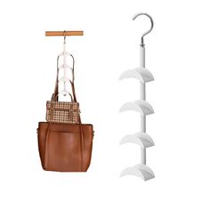 a brown purse hanging from a coat rack