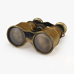 an old pair of binoculars on a white background