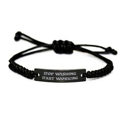 The Engraved Black Rope Bracelet is a beautiful and meaningful gift for friends gift. This bracelet features a Bible verse that is engraved on a small metal plate attached to the durable and adjustable black rope material, making it the perfect fit for any wrist size (8.5-25 cm).  The verse serves as a constant reminder of faith and the love of God, making it a perfect gift for someone who seeks to stay close to God and keep His words close to their heart. This bracelet is a great way to express Black Engraved Bracelets For Friendship, Black Inspirational Friendship Bracelets, Personalized Black Rectangular Bracelets, Inspirational Black Friendship Bracelets, Personalized Inspirational Black Bracelets, Engraved Black Braided Bracelet For Gift, Engraved Black Braided Bracelets For Gifts, Inspirational Personalized Black Bracelets, Customized Adjustable Black Bracelet