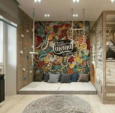 a room with a bed, stairs and a mural on the wall that says almond