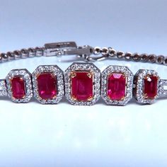 Ruby Bracelet. 3.33ct. Natural Emerald Cut Rubies & .70ct. Round Diamonds Bracelet. Rubies Of Vibrant Red Tones Transparent & Clean Clarity. Diamonds, Rounds Full Cut. G Color Vs-2 Clarity. 14kt. White Gold 10.4 Grams. 10mm Wide Bracelet 7 Inches Long Secure & Comfortable Press Button Lock / Release. $11,000 Appraisal Certificate Will Accompany. Fine Jewelry Red Diamond Bracelet For Formal Occasions, Elegant Ruby Tennis Bracelet For Formal Occasions, Red Fine Jewelry Tennis Bracelet For Formal Occasions, Red Tennis Bracelet For Formal Occasions, Red Luxury Tennis Bracelet For Formal Occasions, Classic Red Diamond Bracelet For Formal Occasions, Classic Red Diamond Bracelet For Formal Events, Elegant Red Tennis Bracelet For Anniversary, Luxury Red Diamond Bracelet For Anniversary