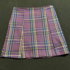 Purple Plaid With Some Blue And Green Never Wore Didn’t Fit Me Trying To Get My Money Back So I Need It Gone Asap Has Built In Shorts Summer Purple Mini Skirt For School, Purple Mini Skirt For School In Summer, Purple Summer School Skirt, Purple Mini Skirt For Summer School, Summer School Purple Mini Skirt, Summer School Purple Skirt, Purple Summer Skirt For School, Purple Pleated Mini Skirt For School, Purple Casual Skort For School