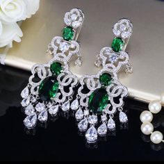 18k White Gold Plated Green Earrings Luxury Pierced Chandelier Earrings For Formal Events, Luxury Crystal Dangle Earrings, Elegant Green Cluster Earrings For Formal Occasions, Luxury Green Chandelier Earrings, Luxury Green Chandelier Earrings For Wedding, Luxury Pierced Chandelier Earrings For Anniversary, Elegant Green Hoop Earrings Pierced, Elegant Green Pierced Hoop Earrings, Elegant Green Dangle Plug Earrings