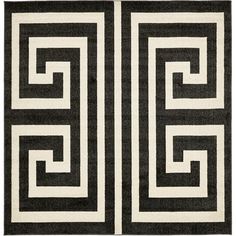 a black and white rug with an intertwined design