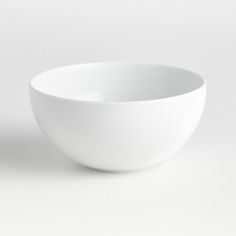 a white bowl sitting on top of a table