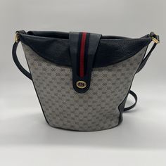 ***This handbag comes with its own Certificate of Authenticity ***US Seller! Fast shipping*** Please look closely at each pic and angle to see exact condition & dimensions. Flaws Noted: small wear on both sides where handle buckles are (see pics). Very minor wear on bottom border. Please understand that I try to best to show true color and dimensions which may not be exact. I also try to showcase any and all flaws that I see. I do not sell any purses with a bad smell! I do spot cleaning and handle all bags with care. Some of these bags are thrifted and some are from my own friends and family’s collection. All bags will be shipped with love and care - each will be placed inside a dust bag before shipment. I try also to maintain every bag’s shape by placing bubble wrap, tissue paper, or styr Chic Gucci Bucket Bag With Removable Pouch, Designer Gucci Bucket Bag With Removable Pouch, Designer Gucci Bucket Bag With Detachable Strap, Gucci Chic Bucket Bag With Gold-tone Hardware, Chic Gucci Bucket Bag With Gold-tone Hardware, Gucci Bucket Bag With Gold-tone Hardware, Gucci Bucket Bag With Gold-tone Hardware For Travel, Chic Gucci Formal Bucket Bag, Gucci Luxury Bucket Bag With Removable Pouch