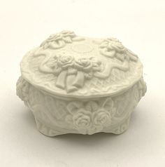 This beautiful ceramic bisque jewelry box features a lovely floral design of roses and ribbons, with a matte finish and raised relief texture. Measuring 3.75  inches wide and 2 inches tall  (+/-), this small trinket dish is perfect for keeping jewelry or other small treasures. The Victorian-style box is made of porcelain and ceramic, and is suitable for any room in the house. It requires no additional parts and is easy to care for with warm water. With its artful design and fantasy-themed motif, this original keepsake box is sure to make a wonderful addition to any collection. Thank you for your consideration and viewing items in our ebay store - A Little Extra Joy. Item(s) is/are as pictured. Use pictures as reference in addition to the above description.  We would be happy to combine shi Ceramic Jewelry Holder, Ceramic Boxes, Ceramic Bisque, Style Box, Cake Box, Ceramic Jewelry, Box With Lid, Keepsake Box, Keep Jewelry