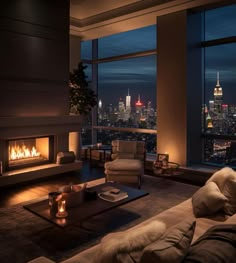 a living room filled with furniture and a fire place in front of a large window