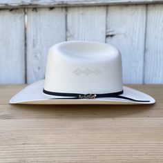 Price INCLUDES taxes and SHIPPING anywhere in the United States!
Known for its versatility and popularity, the 50X Fantasma cowboy hat from Rocha Hats comes in a featherless version, maintaining its classic appeal. With a 3 1/4" brim and a 4 1/2" crown, this Mexican-made hat is ideal for fans of the cowboy style who prefer a simpler, but equally elegant design.
Description of the Hat:
Style: 50X Fantasma
Brand: Rocha Hats
Brim: 3 1/4"
Crown: 4 1/2"
Made in Mexico
To protect your hat: Dust your h White Western Sun Hat For Kentucky Derby, White Western Panama Hat With Curved Brim, White Panama Hat With Short Brim For Rodeo, White Short Brim Panama Hat For Rodeo, White Western Straw Hat With Short Brim, White Western Fedora Straw Hat, White Western Style Straw Hat With Short Brim, White Western Wide Brim Straw Hat, White Western Panama Hat For Western-themed Events