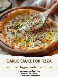 an advertisement for garlic sauce for pizza with a spoon in the bowl and other food on the table