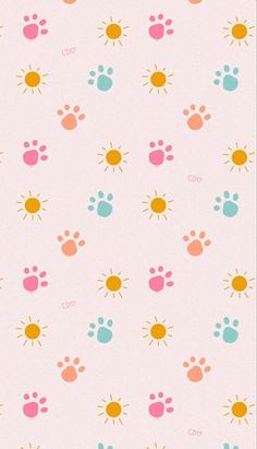 a pink background with colorful paw prints on it