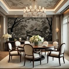 an elegant dining room with wallpaper and chandelier above the table in front of a painting