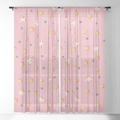 pink curtains with polka dots and flowers on them