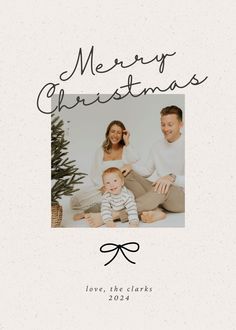 a merry christmas card with the words love, the clarks and a photo of a baby