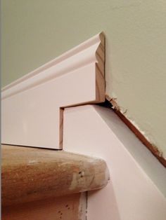 the corner of a room that has been stripped off and is being used as a window sill