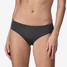 These low-rise, high-performance bikini bottoms with minimal seat coverage are designed to keep you streamlined in the surf. Made in a Fair Trade Certified™ factory. | Patagonia Women's Cheeky Bikini Bottoms in Ink Black, Medium - Surf Bikinis & Swimwear - Recycled Nylon/Recycled Polyester 50% Logo, Surf Bikinis, Cheeky Bikinis, Patagonia Womens, Fair Trade, Patagonia, Polyester Spandex, Low Rise, High Performance