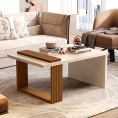 a living room with couches, chairs and a coffee table in the middle of it