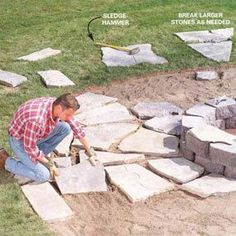 a man working on some kind of stone wall